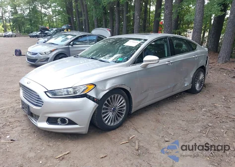 2013 Ford Fusion Hybrid Titanium z USA, uszkodzony, nr VIN 3FA6P0RU2DR302347